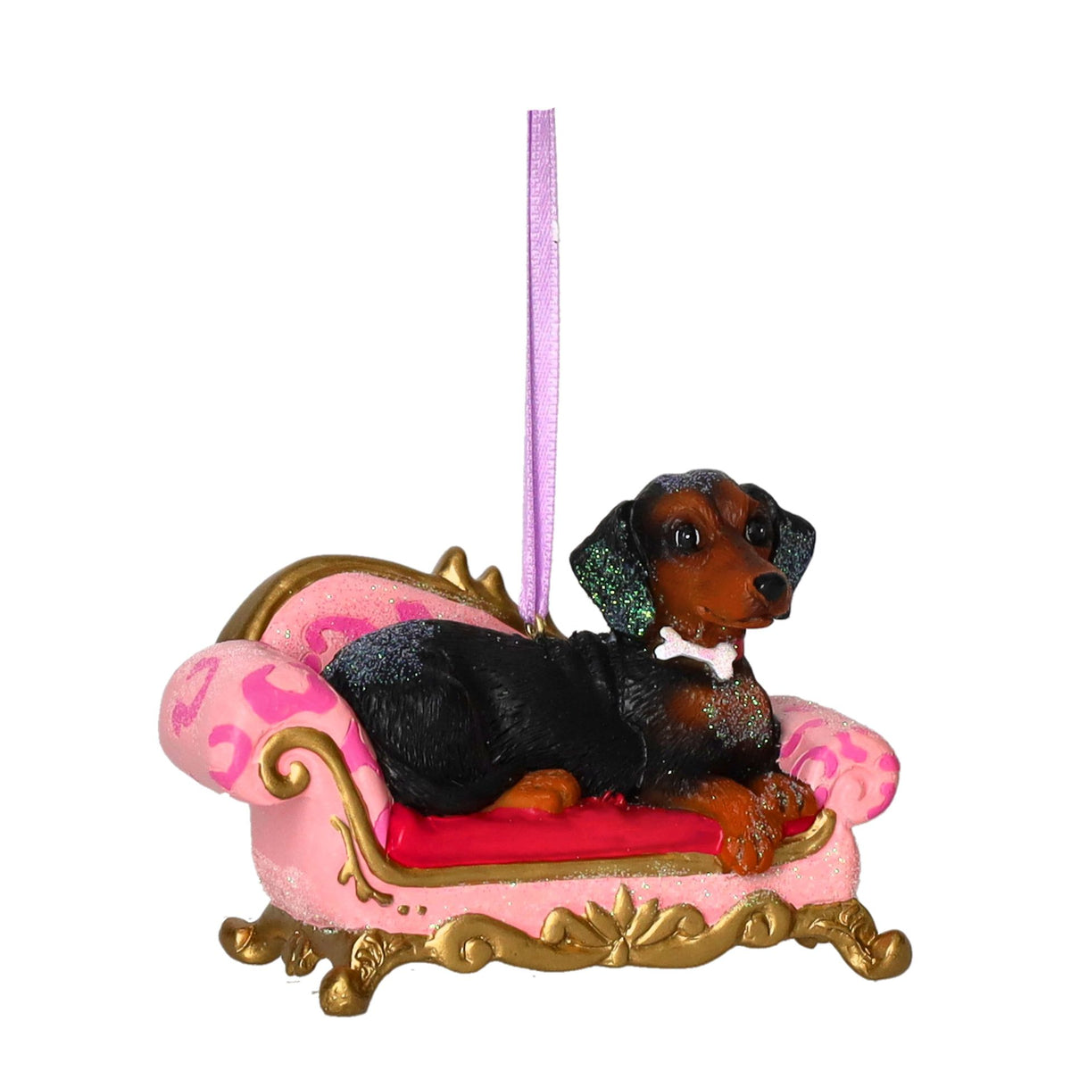 Hänger Dackel auf Sofa