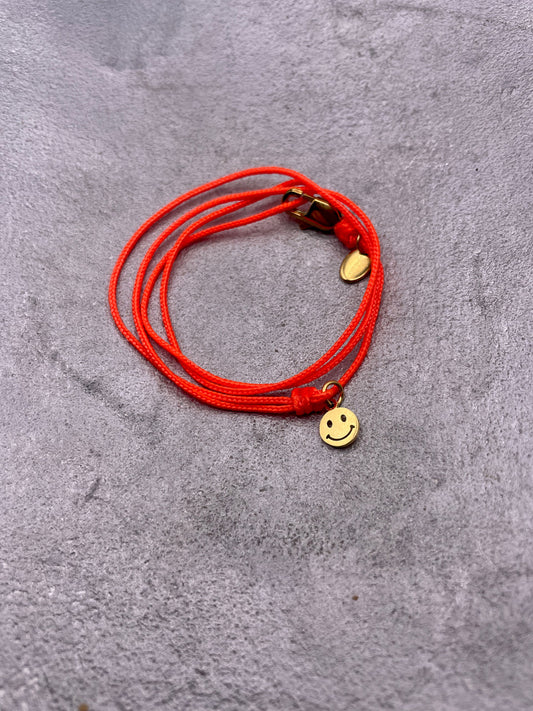 band bandit Armband Smiley neon orange